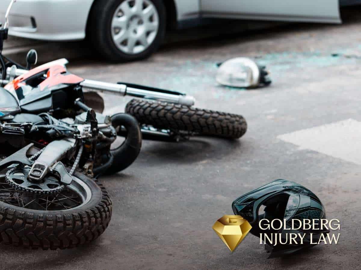 Motorcycle crash aftermath showing damaged bike and helmet, highlighting the dangers of motorcycle accidents in Las Vegas